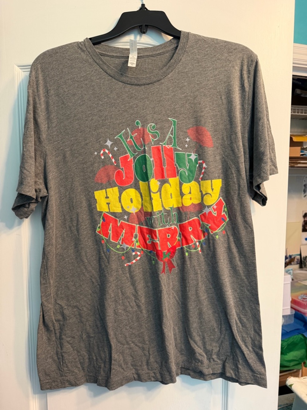 It’s a Jolly Holiday Tee with Red Green and Yellow Graphic